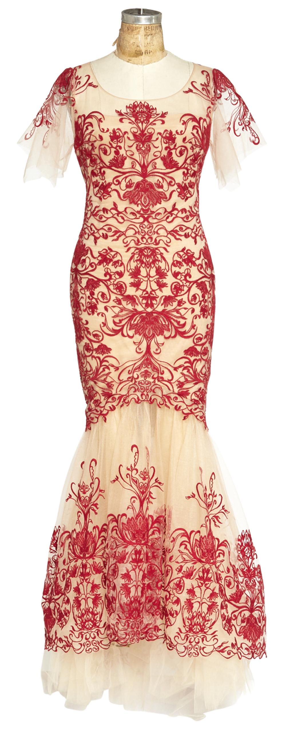 LINDA EMOND Marchesa Notte red lace dress worn to the: LINDA EMOND Marchesa Notte red lace dress worn to the 2014 Tony Awards when nominated for Best Performance in Cabaret. The dress with red lace over a nude body; Together with a Celine black crepe warp