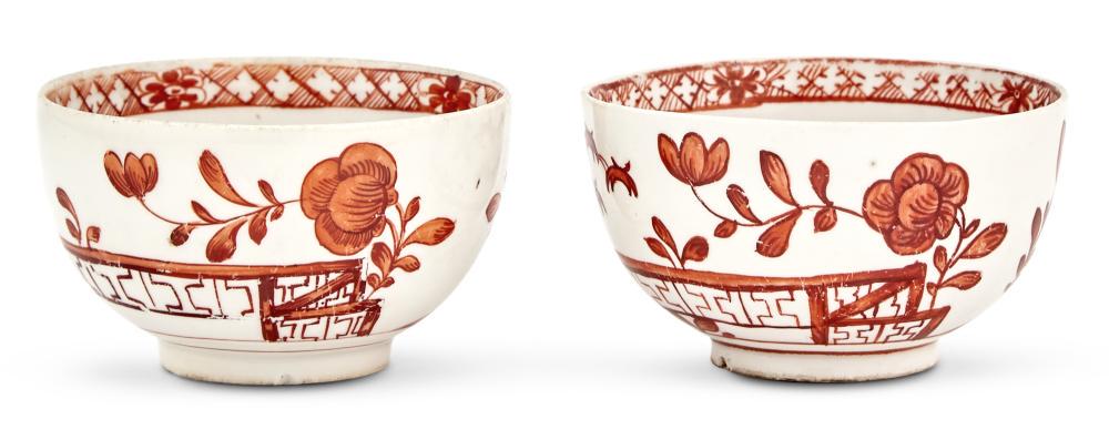 Two Zurich Porcelain Teabowls: Two Zurich Porcelain Teabowls Circa 1765-70, blue crossed Z and double dot marks, incised numerals to both In the Chinese taste, each painted in monochrome iron-red with meandering flowers, a tree and