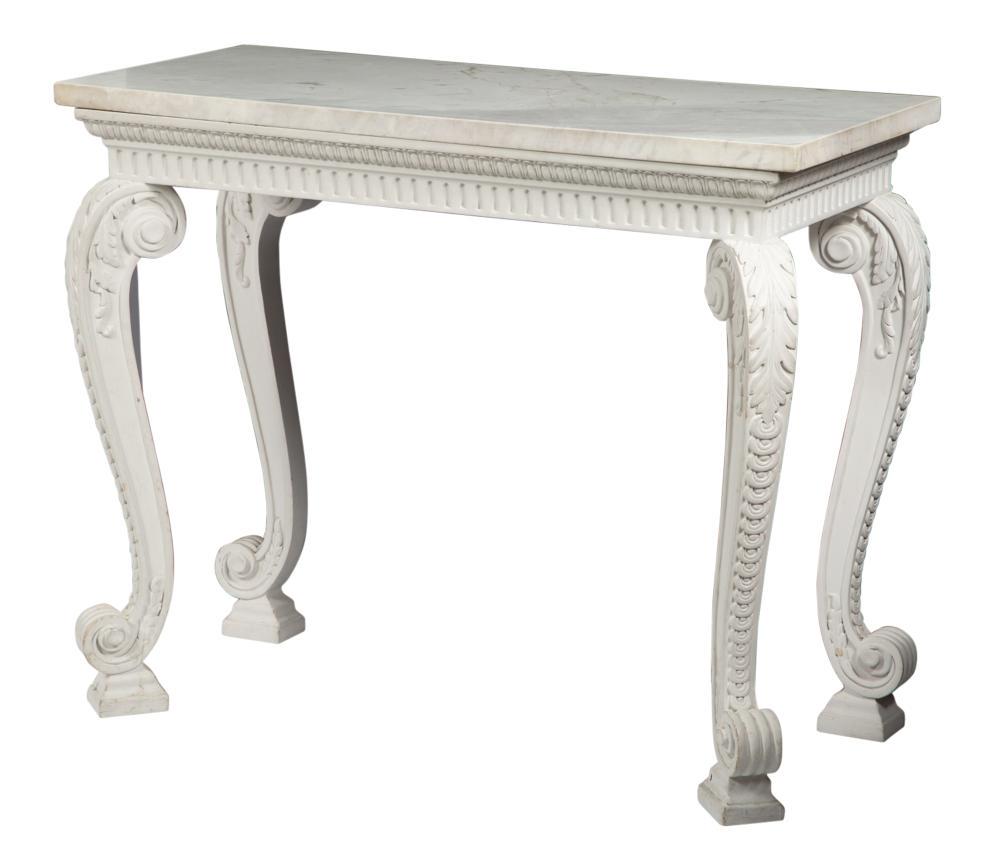 George III Style Marble Top White Painted Wood Console: George III Style Marble Top White Painted Wood Console Table Manner of William Kent Height 32 1/2 inches, width 39 inches, depth 19 inches. C An Apartment Decorated by Miles Redd
