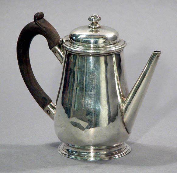 George II Silver Coffee Pot: George II Silver Coffee Pot James Smith, London, circa 1734-5 Of tapering form, with a straight spout, hinged lid and treen C-form handle, raised on a circular foot. Height 6 inches (15 cm), approxim