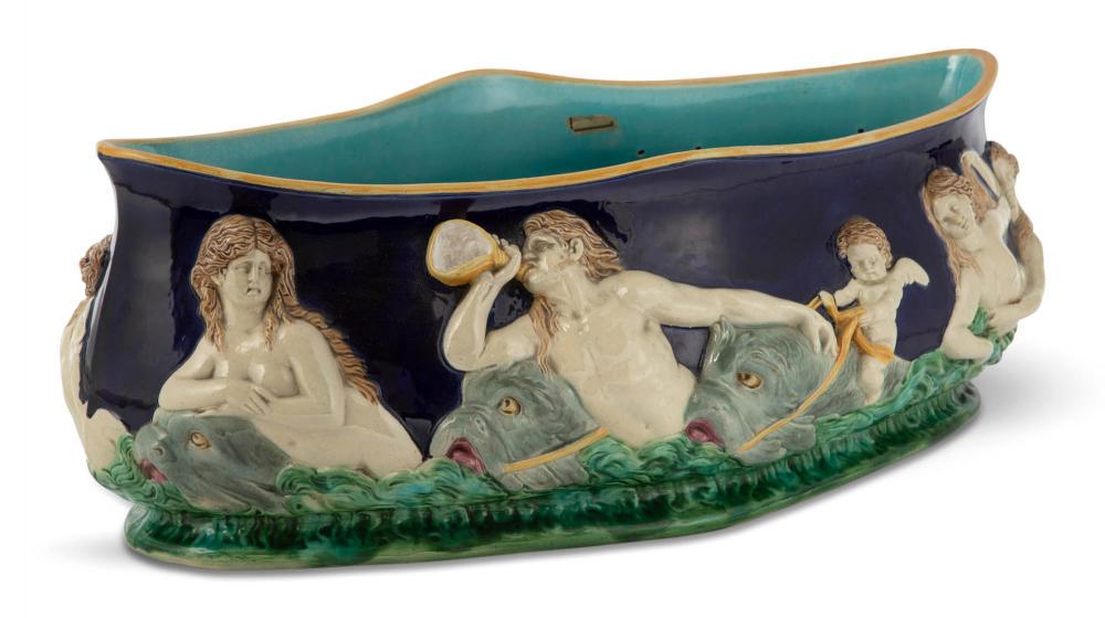 George Jones Majolica Cobalt-Blue Ground Oval 'Neptune': George Jones Majolica Cobalt-Blue Ground Oval 'Neptune' Centerpiece Bowl Circa 1875 Impressed GJ monogram mark and 8A, black painted shape no. 2784 and backward F Molded with a continuous frieze of a 