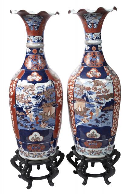 Pair of Japanese Imari Porcelain Palace Vases: Pair of Japanese Imari Porcelain Palace Vases On wooden stands. Height 43 inches, overall height 51 1/2 inches. C