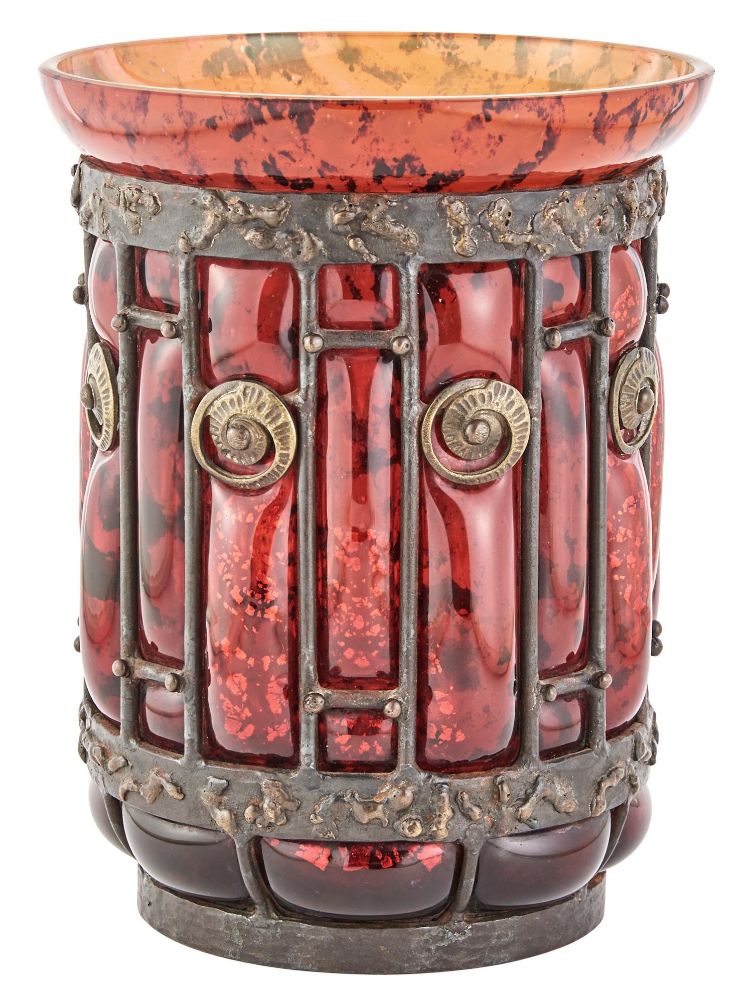 Louis Majorelle and Daum Art Deco Iron and Blow-Out: Louis Majorelle and Daum Art Deco Iron and Blow-Out Glass VaseCirca 1920Of cylindrical form with a flaring mouth, in mottled red and black colored glass, internally decorated with silver foil inclusio