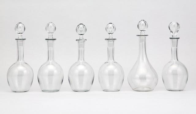 Group of Six Baccarat Glass Cordial Decanters and Stoppers: Group of Six Baccarat Glass Cordial Decanters and Stoppers Height of tallest 8 1/2 inches. C The Estate of a European Collector