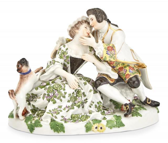 Meissen Porcelain Figural Group of Seated Lovers and a Pug: Meissen Porcelain Figural Group of Seated Lovers and a Pug After J.J. Kaendler Height 4 1/2 inches, width 6 1/8 inches. C