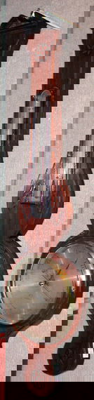 George III Mahogany Wheel Barometer: George III Mahogany Wheel Barometer L. Pozzi & Co. Gloucester Height 39 inches.