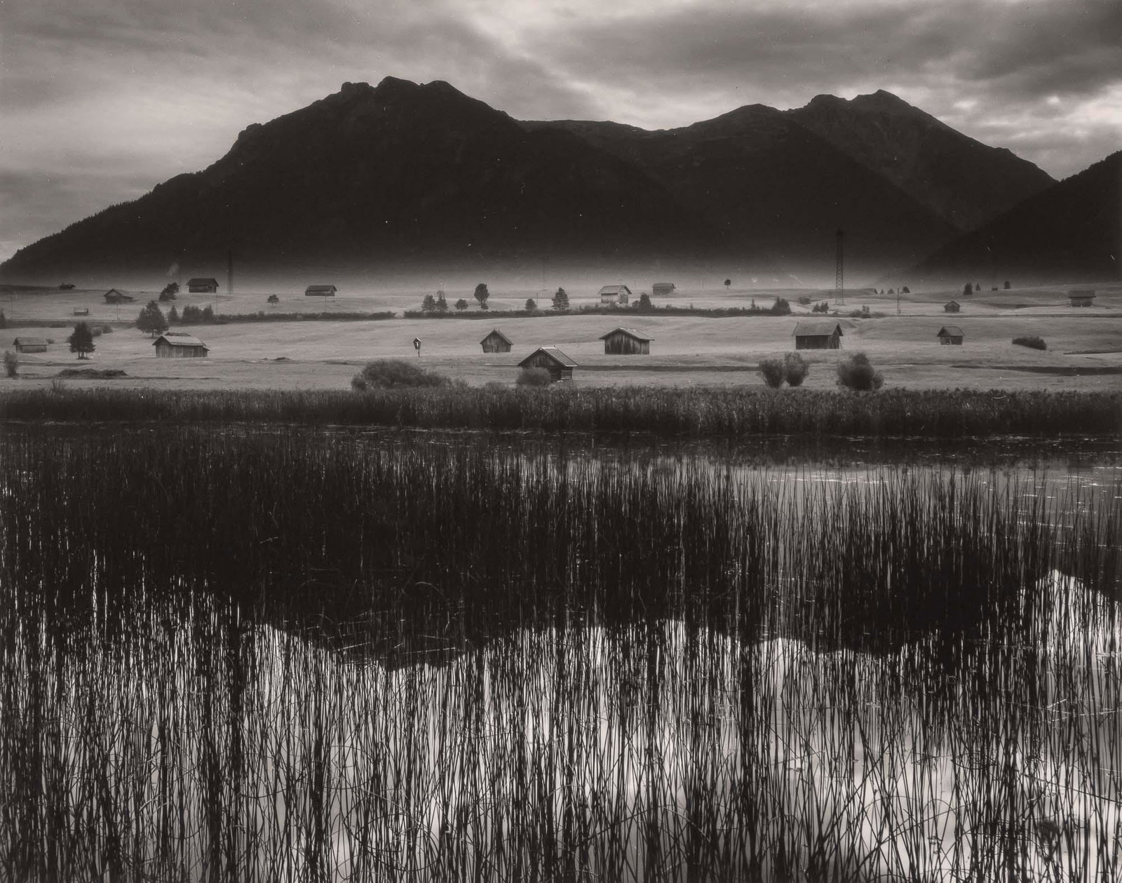 WESTON, BRETT (1911-1993) Untitled [Landscape, Germany], 1960.: WESTON, BRETT (1911-1993) Untitled [Landscape, Germany] , 1960. Vintage gelatin silver print, 1/2 x 9 1/2 inches (195 x 242 mm), dry-mounted, signed and dated by the photographer in pencil on the moun