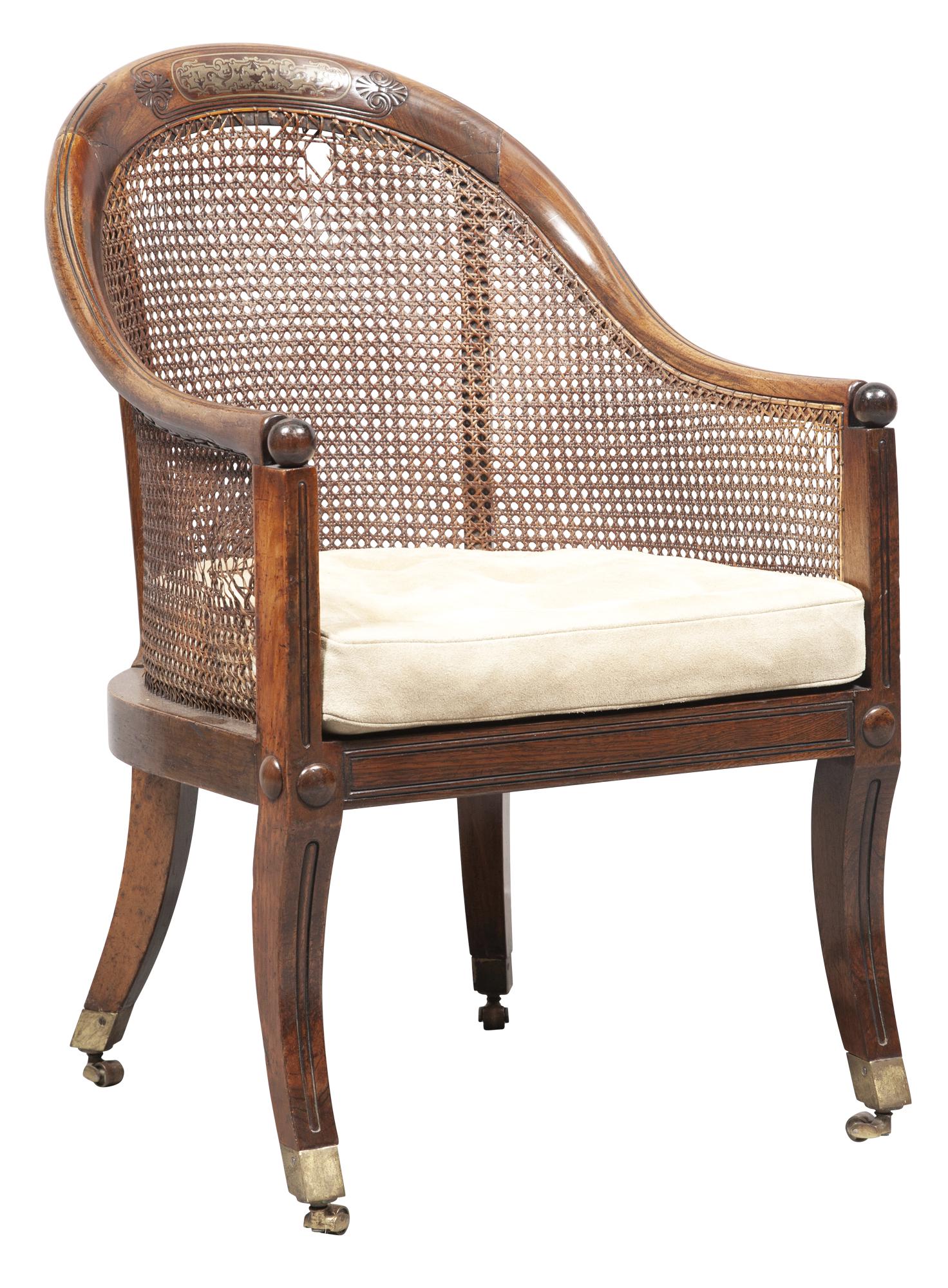 Regency Brass Inlaid Rosewood and Mahogany Spoon-Back Armchair: Regency Brass Inlaid Rosewood and Mahogany Spoon-Back Armchair Circa 1810 The front seat rail stuck with the initial I. Height 34 1/2 inches (87.6cm), width 25 inches (63.5cm), depth 22 inches (55.9cm