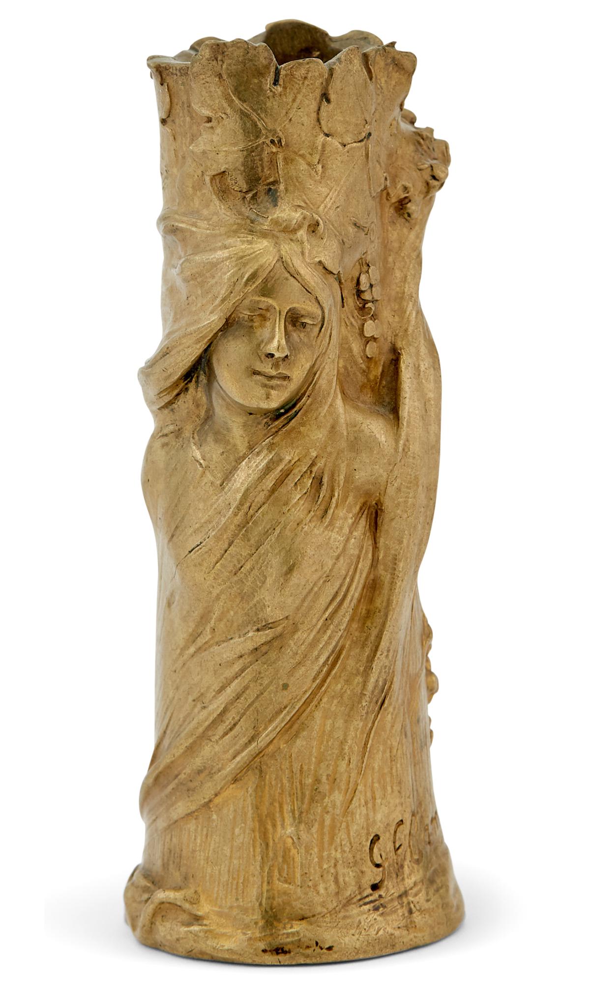 French Art Nouveau Gilt-Bronze Figural Bud Vase: French Art Nouveau Gilt-Bronze Figural Bud Vase Cast from a model by Georges Flamand, circa 1900 Of tree trunk form, cast with the faces of two symbolist women, in high relief, inscribed G. Flamand. H