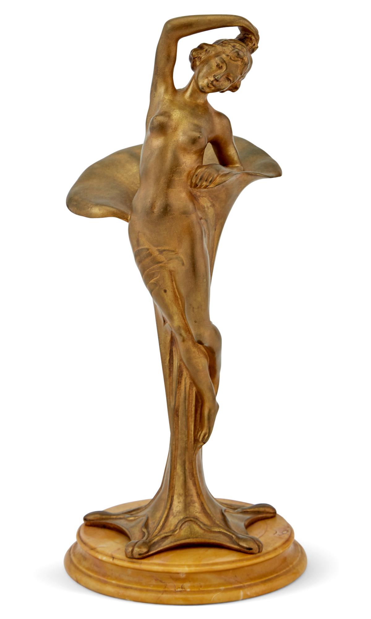 Continental Art Nouveau Gilt-Bronze Figural Bud Vase: Continental Art Nouveau Gilt-Bronze Figural Bud Vase Circa 1900 In the form of a nude woman stretching with her back against a lily blossom, mounted on a yellow marble base, inscribed ROSKAM. Height o