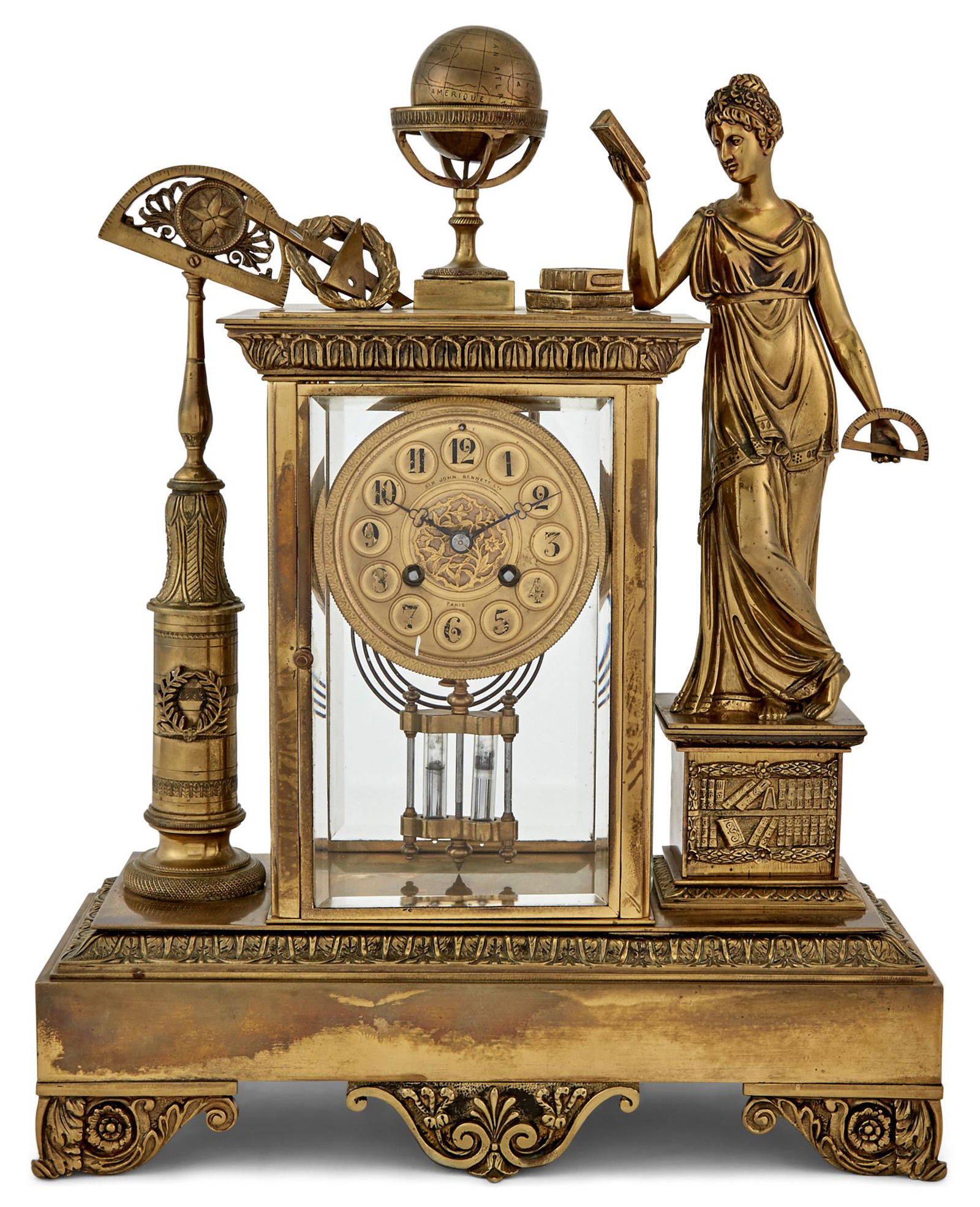 Gilt-Bronze Mantel Clock: Gilt-Bronze Mantel Clock Sir John Bennett Ltd., Paris, late 19th century Decorated with symbols of exploration and knowledge, with a mercury temperature-compensating pendulum. Height 18 inches, width