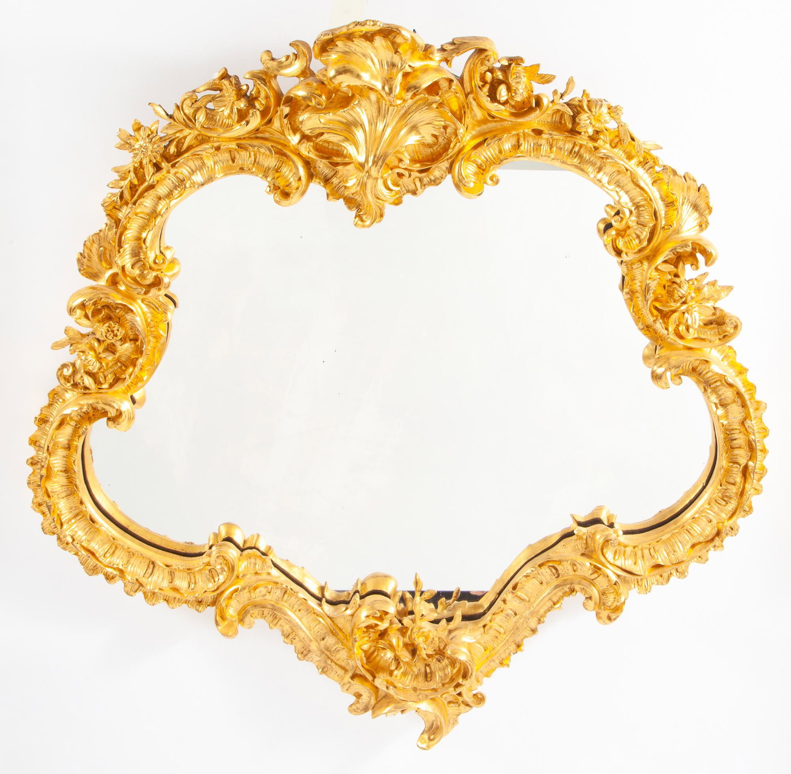 Rococo Style Giltwood Mirror: Rococo Style Giltwood Mirror Height 46 1/4 inches, width 44 inches. C The Estate of a Park Avenue Lady