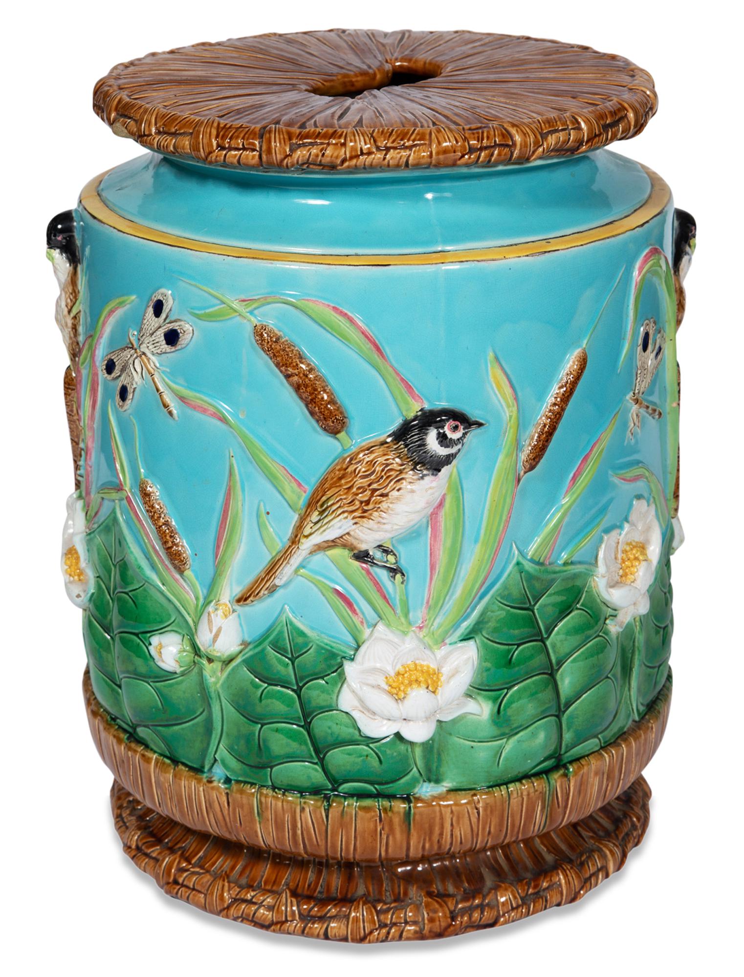 George Jones Majolica 'Indian' Turquoise-Ground Garden Seat Recorded as shape no. 3380, circa 1875: George Jones Majolica 'Indian' Turquoise-Ground Garden Seat Recorded as shape no. 3380, circa 1875 Of barrel shape, the sides molded in relief with dragonflies in flight and birds perched among bulrus