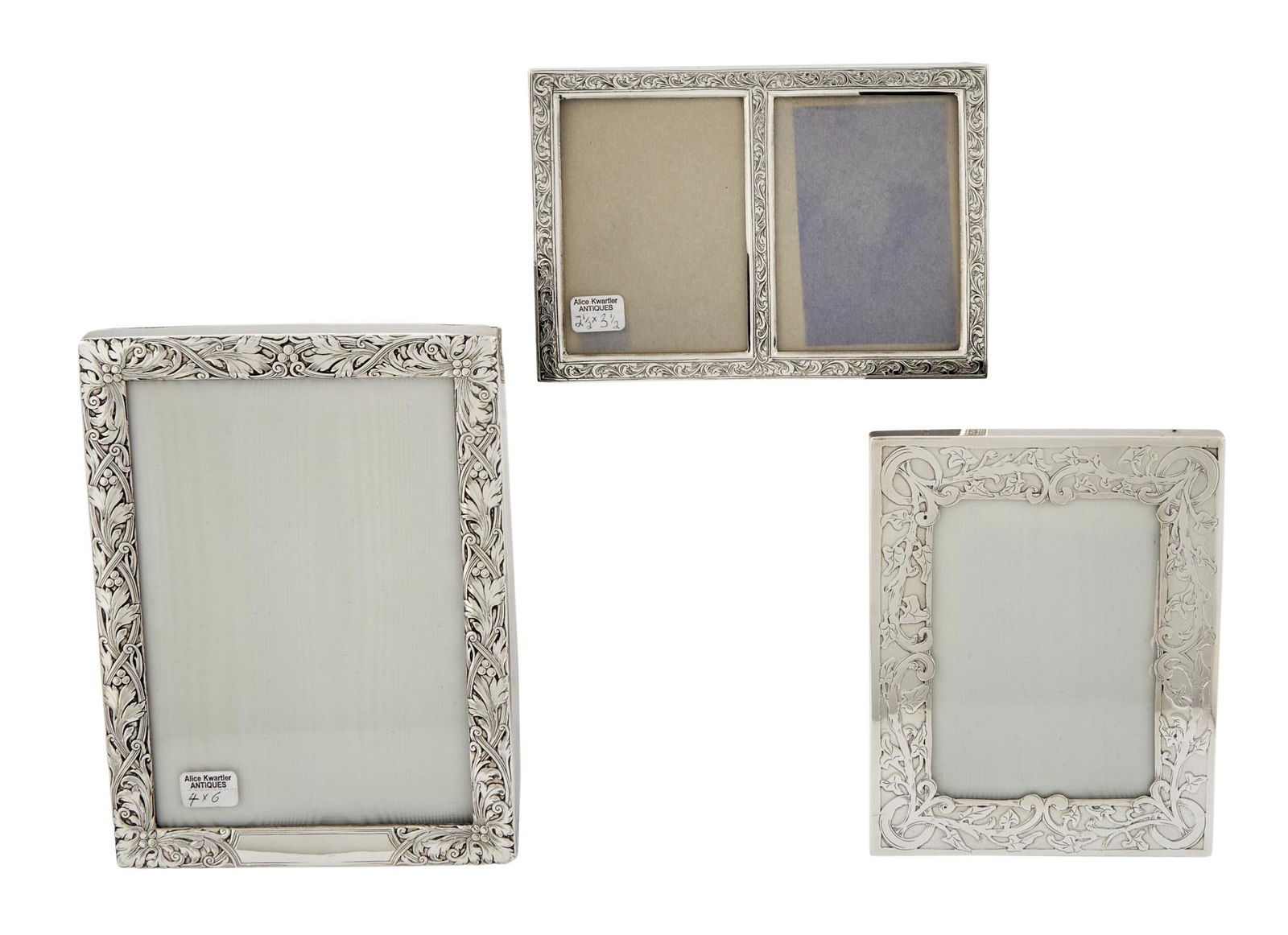Three American Sterling Silver Picture Frames: Three American Sterling Silver Picture Frames 20th Century Each with a foliate scroll border, one with a double frame. Height of largest 7 1/4 inches, width 5 1/4 inches; height of middle 5 3/4 inches