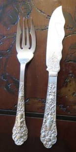 Gorham Sterling Silver "Medici" Pattern Fish Service Late 19th century: Comprising ten fish forks and ten fish knives; Toegether with a Set of Six Tiffany & Co. Sterling Silver Chrysanthemum Pattern Egg Spoons. Total approximately 36 ounces.