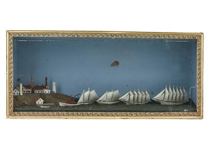Carved and Painted Shadowbox Diorama: Depicting four sailing vessels below the two lighthouses at Cape Elizabeth, Maine, in a giltwood frame. Height 13 inches, width 31 5/8 inches, depth 8 1/8 inches. Provenance: Hyland Granby Antiques, H