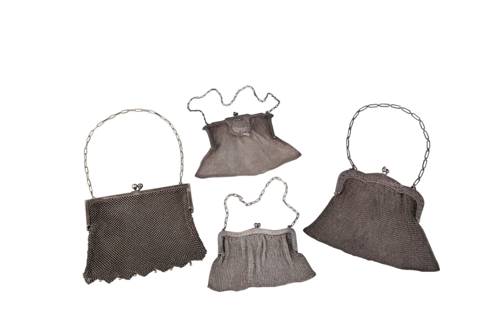Four Silver and Silver Plated Mesh Evening Bags First half 20th century (1 of 1)