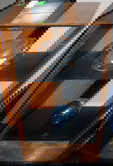 Two Paldao Cabinets: Two Paldao Cabinets Designed by Gilbert Rohde for Herman Miller One with sliding glass doors. Height of smaller 40 inches, width 21 1/4 inches, depth 17 inches.