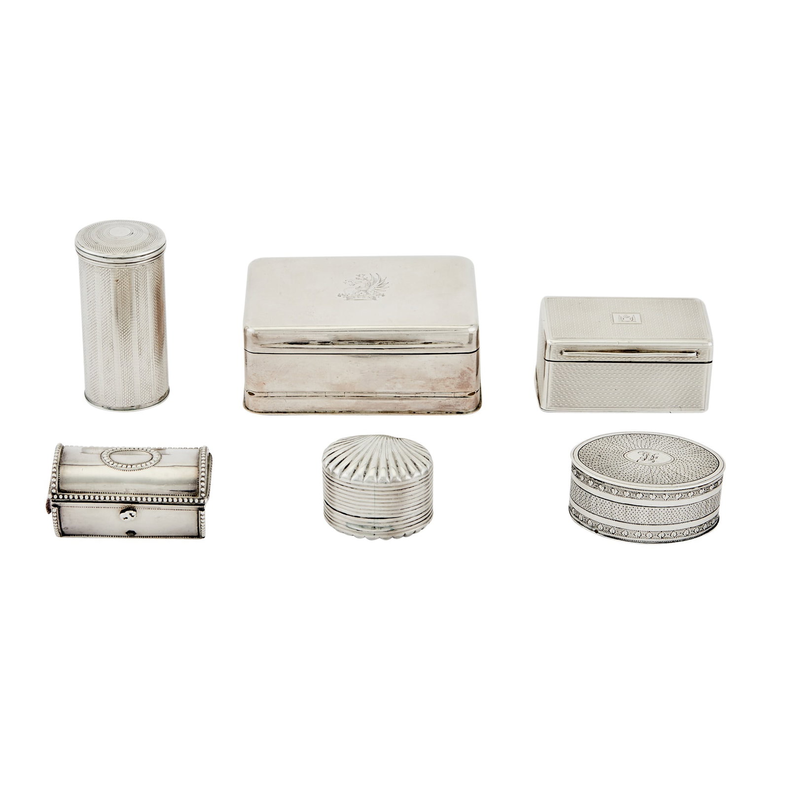 Six Georgian Sterling Silver Nutmeg Graters 18th/19th Century, various makers: Comprising: Larger rectangular example marked Phipps & Robinson, London, 1804, length 3 inches (7.5 cm). Casket-form marked London, 1791, length 2 inches (5 cm). Rectangular example marked Charles