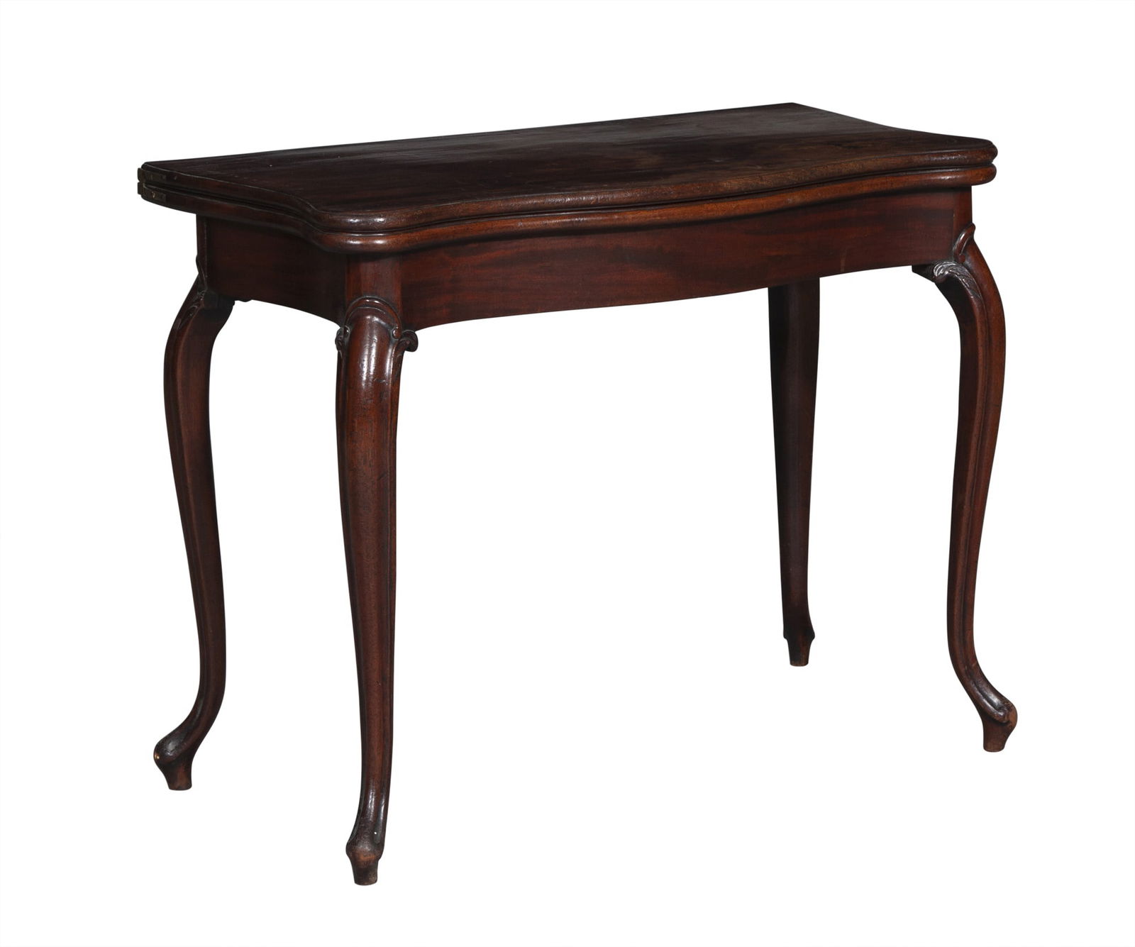 George III Mahogany Card Table Circa 1760, in the manner of Thomas Chippendale,: The hinged serpentine top opening to a lined playing surface, the conforming frieze raised on scroll-carved cabriole legs ending in scroll toes; the right back leg swinging open to reveal a hidden dra