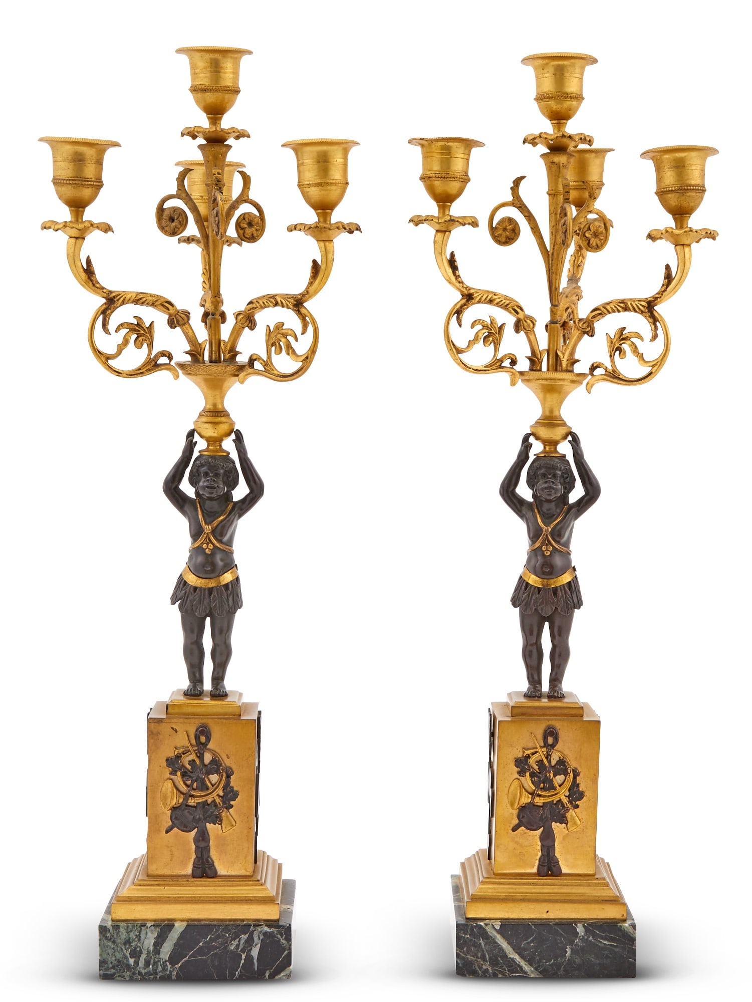 Pair of French Patinated and Parcel-Gilt Bronze Four Light Candelabra: Height 19 1/4 inches.
