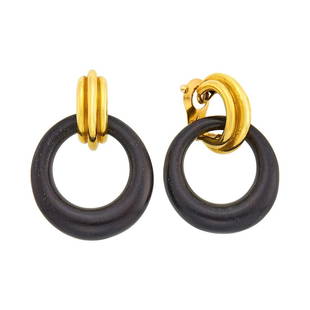 Van Cleef & Arpels Pair of Gold and Wood Hoop Earclips, France: Estate / Collection: Collection of an International Family.18 kt., tapered oval wood hoops ap. 38.0 x 36.0 mm., signed VCA, no. 109238, with maker's marks and French assay marks, hoops detachable,