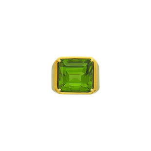 Tiffany & Co., Paloma Picasso Gold and Peridot Dome Ring: 18 kt., one emerald-cut peridot ap. 25.15 cts., signed Tiffany & Co., Paloma Picasso, 1980, ap. 21 dwts. Size 6 1/2, with bumpers.