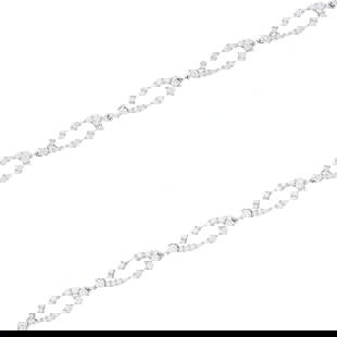 Harry Winston Platinum and Diamond 'Loop Diamond' Bracelet: 154 round diamonds ap. 7.80 cts., signed HW, no. 121337, ap. 15 dwts. Length 7 3/8 inches.