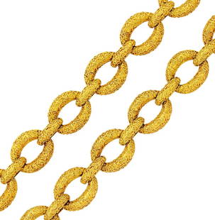 Van Cleef & Arpels Pair of Gold Bracelets/Necklace Combination: Estate / Collection: Estate of an Elegant Lady 18 kt., bombé oval textured links applied with raised polished bands, signed VCA, no. 2V615.90, convertible into a necklace, ap. 96.2 dwts. Lengths