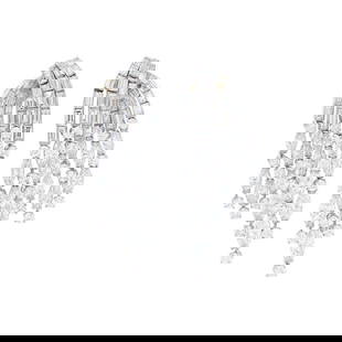 Van Cleef & Arpels Pair of Platinum and Diamond 'Waterfall' Earclips: 38 round, 52 baguette and 26 marquise-shaped diamonds ap. 10.00 cts., signed Van Ceef & Arpels, N.Y., no. 24058, ap. 18.4 dwts. With signed box.