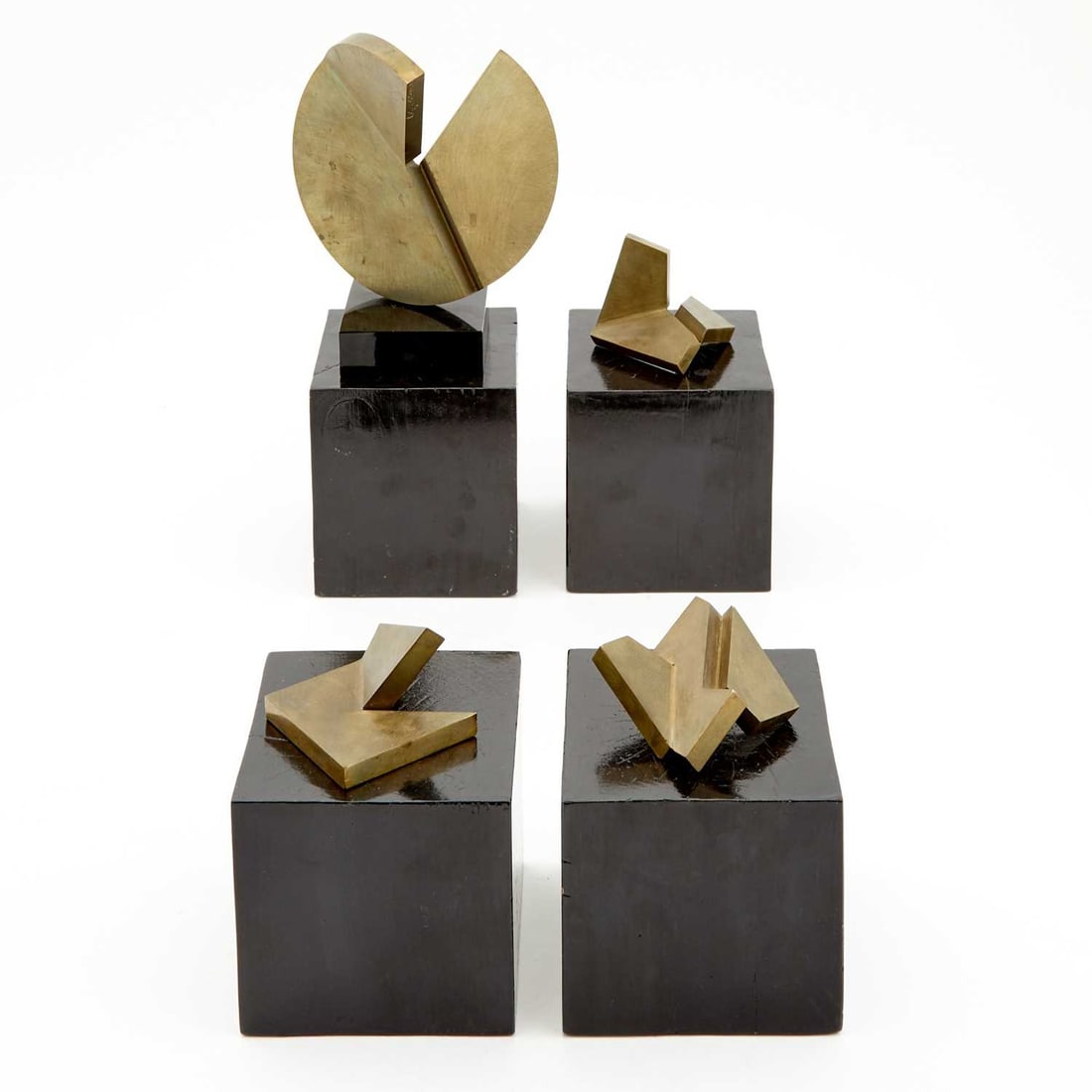 Gordon Hammond Smith: Estate / Collection: Property from the Estate of Erika Hecht Wadds Canadian, b. 1937 Untitled: Four One signed and numbered Gord 5/9 on the side Bronze with light brown patina Height of largest 6 1/8