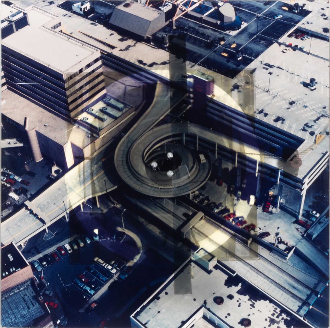 Jon Kessler: American, b. 1957 Over Stamford, 1989 Signed Jon Kessler and numbered 9/9 Photograph on plexiglas with aluminum, fluorescent light and motor 22 1/2 x 22 1/2 x 9 inches (57.2 x 57.2 x 22.9 cm) Provenan