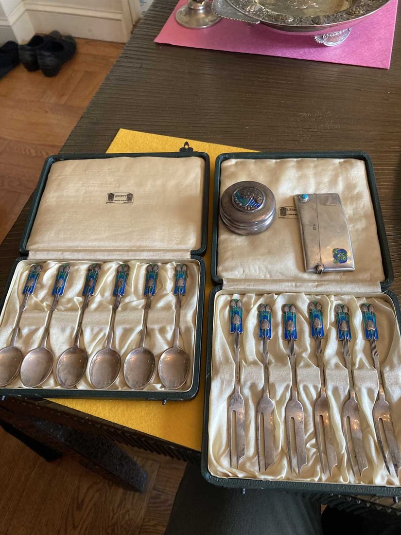 Group of Liberty & Co. Sterling Silver and Enamel Articles Early 20th century: Comprising: Cased set of six cocktail forks, Birmingham, 1928 Cased set of six teaspoons, Birmingham, 1928 Card case, Birmingham, 1905 Pill box, Birmingham, 1907
