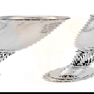 Georg Jensen Sterling Silver Louvre Bowl: Estate / Collection: Property from a Gold Coast Long Island Private Collection The circular bowl on an openwork stylized berry and foliate stem, ending a stepped circular foot, fully hallmarked. Heigh