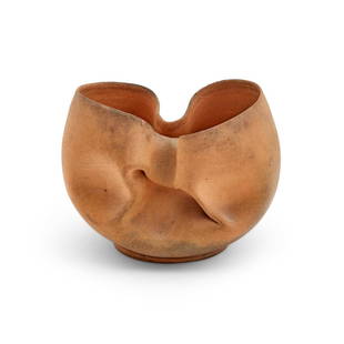 George Ohr Terracotta Vessel: Of organic form, with a pinched and folded body, unglazed, impressed on the underside G. E. OHR Biloxi, Miss. Height 3 3/8 inches, width 4 inches.