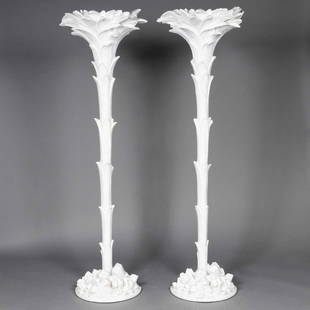 Pair of Syrie Maugham Plaster Torcheres: Each with a foliate top and rockery base. Height 6 feet, width 20 inches, depth 12 inches.