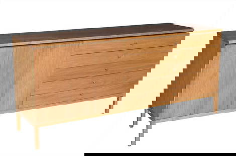 Paul McCobb for Calvin Walnut Sideboard: Estate / Collection: Property from the Estate of Blanche Cirker Rectangular with five drawers and a folding door. Height 32 1/4 inches, width 71 1/4 inches, depth 19 inches.
