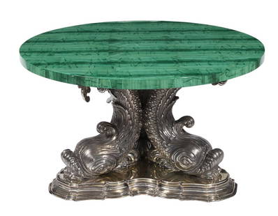 Gianmaria Buccellati Sterling Silver and Malachite Table: Estate / Collection: Property of a New Jersey Collector The shaped triangular base with three addorsed dolphins supporting a circular malachite top. Height 20 1/2 inches, diameter 35 3/4 inches. Liter