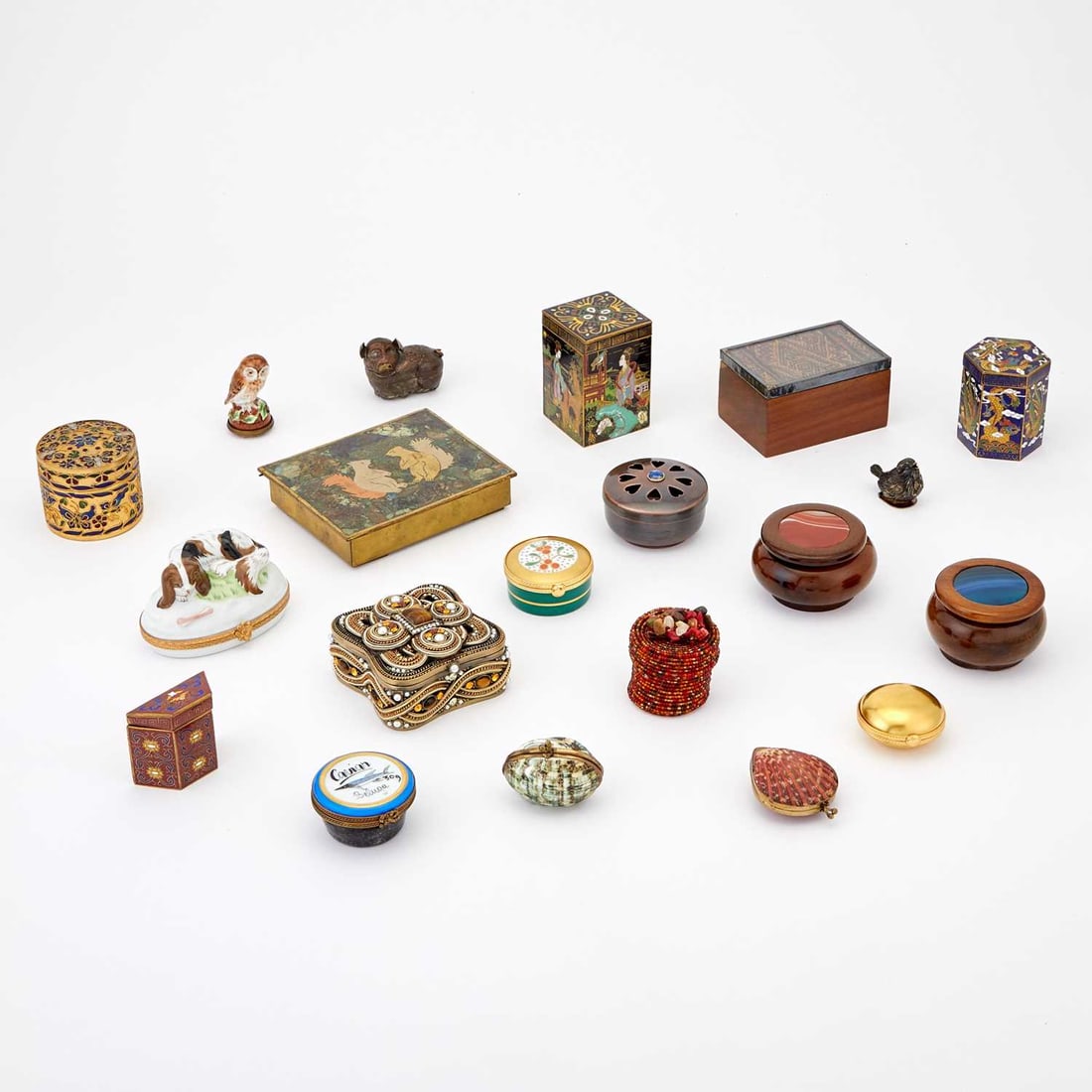 Group of Decorative Boxes: Estate / Collection: Estate of Renee Meyers from a Manhattan Apartment Decorated by Albert Hadley Including Chinese cloisonne boxes, shell boxes, an Olivia Riegel box, ceramic boxes, etc. Approximatel