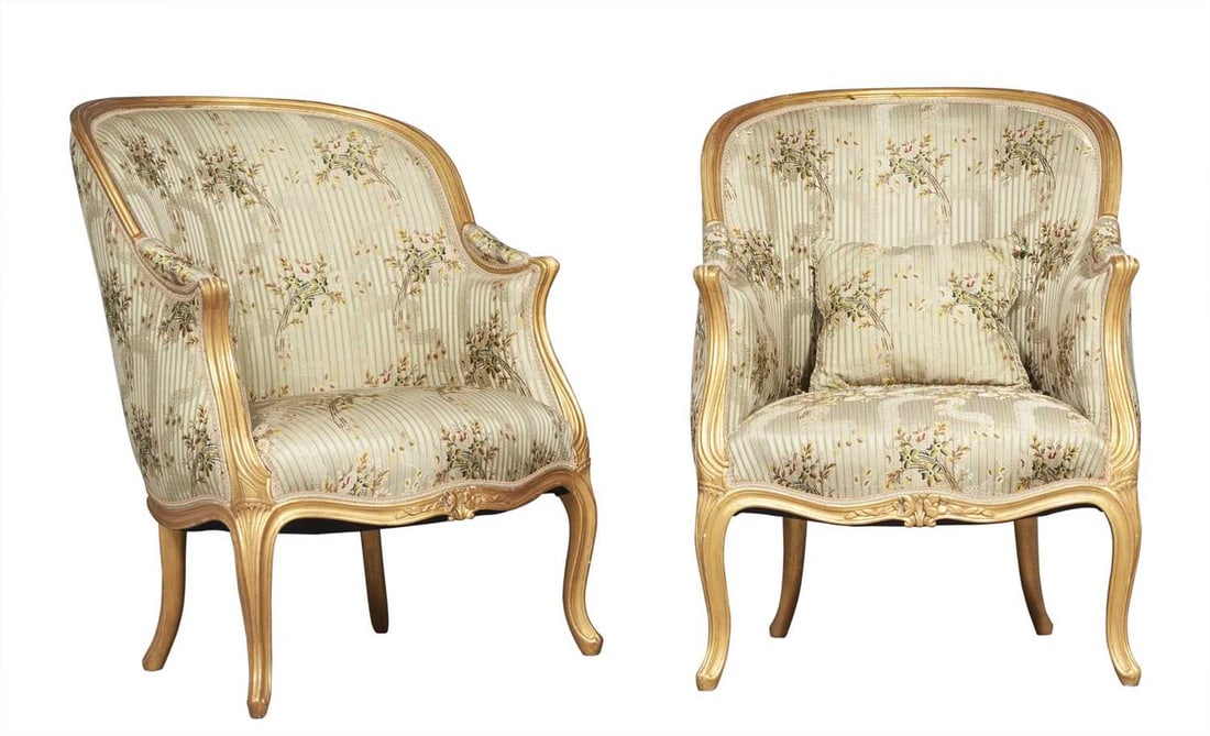 Pair of Louis XV Style Giltwood Bergères: With two pillows. Height 37 1/4 inches, width 28 inches, depth of seat 22 inches. Notes: The silk fabric was designed by Pierre Pozier (grandson of Frederic Schumacher) and custom woven from the patte