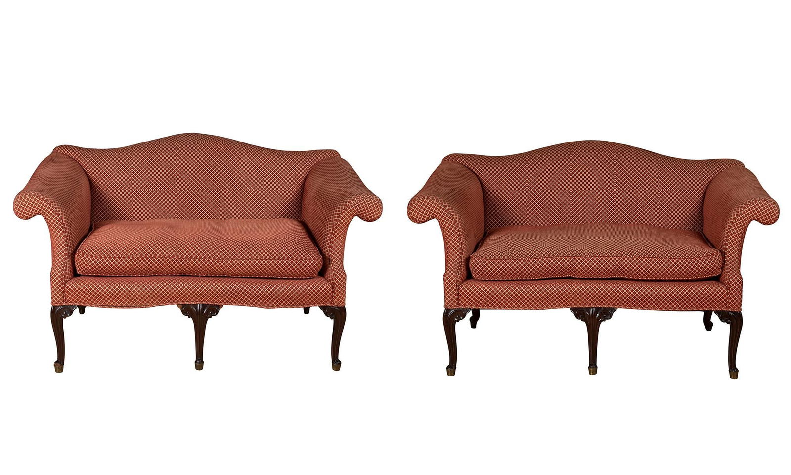 Pair of George III Style Mahogany Settees: Height 37 1/4 inches, width 61 1/2 inches, depth of seat 23 inches. losses to center front leg of one; edgewear