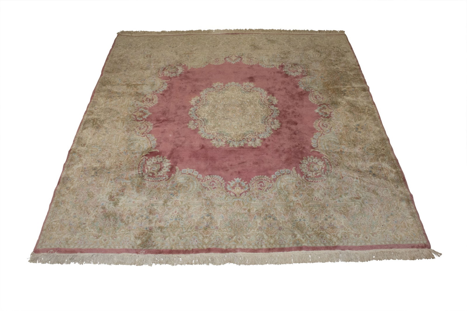 Kerman Carpet: Southeast Iran, Mid-20th Century The central circular medallion on the open rose field is within an ivory palmette border. (9' 0" x 8' 7")