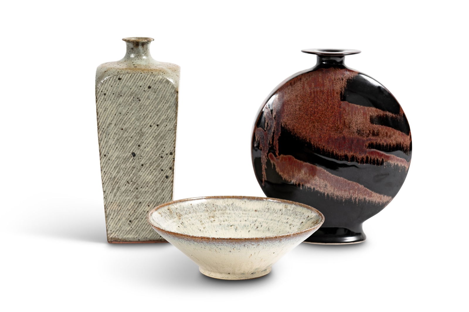 Three Glazed Pottery Articles: Estate / Collection: Property of The Constable Family, Cambridge and Sherborn, Massachusetts Comprising a flask-form vase with honan tenmoku glaze by Brother Thomas Bezanson, Weston, Vermont, (1929-20