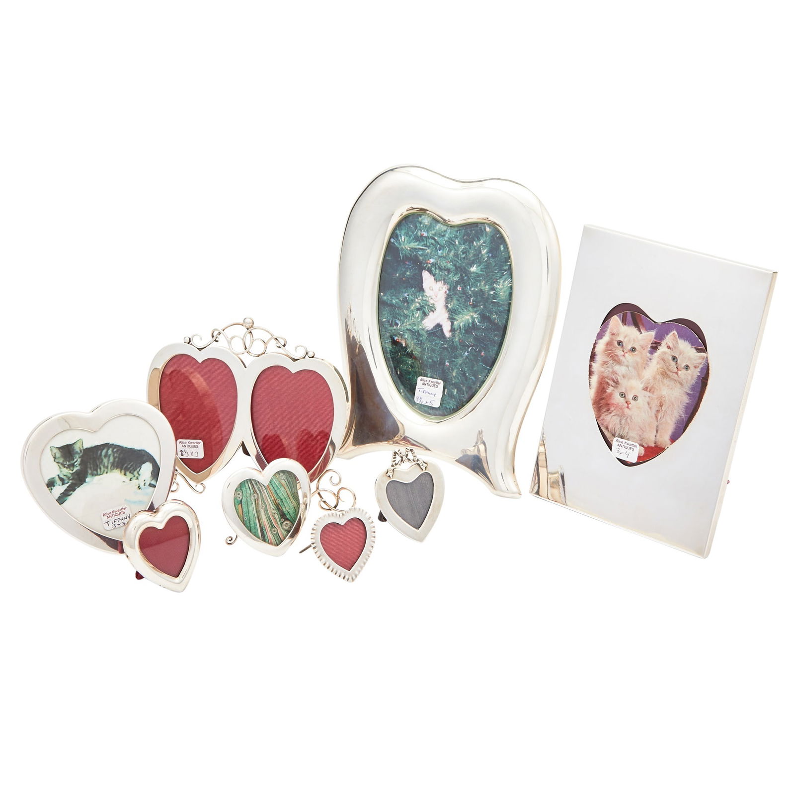Eight Sterling Silver Heart-Shaped Picture Frames: 20th Century Estate / Collection: The Alice Kwartler Collection In various shapes and sizes, including a double picture frame example made in England, height 5 inches, width 6 inches; a Tiffany &