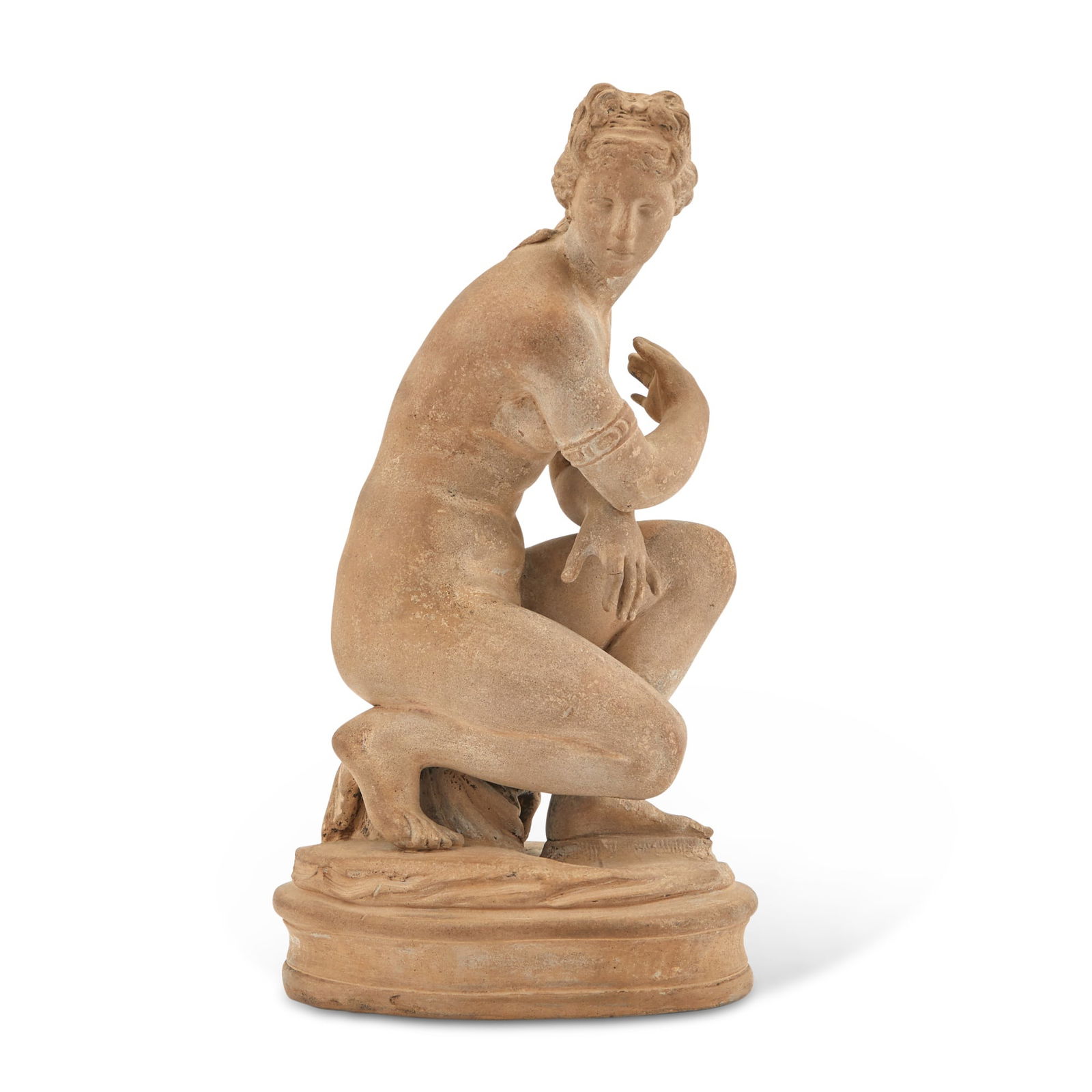 Terracotta Sculpture of Crouching Venus: In an acrylic box. Height 10 3/4 inches.