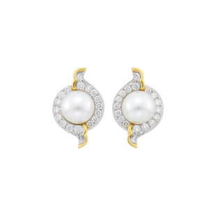 Angela Cummings, Assael Pair of Gold, Platinum, South Sea Cultured Pearl and Diamond Earclips: 18 kt., 2 pearls ap. 11.6 and 11.8 mm., 40 round diamonds ap. 2.50 cts., signed Cummings, Assael, ap. 18.6 dwts.  Pearls: white, one with faint rose orient, one with green orient, minor s