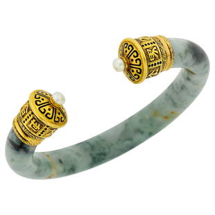 Cartier Gold, Jade, Cultured Pearl and Black Enamel Bangle Bracelet, France: 2 button pearls ap. 5.0 mm., signed Cartier, with French assay mark. Inner circle 7 3/4 inches, with open front.  Jade: light green with deeper green mottling, minor brown mottling, faint surface