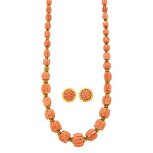 Gold and Carved Coral Bead Necklace and Pair of Earclips: 18 kt., 36 barrel-shaped coral beads of melon motif ap. 28.0 x 17.6 mm. to 10.3 x 9.8 mm., small single-cut diamonds, 2 circular fluted domed coral ap. 18.2 mm. Length 28 inches. With extra coral and