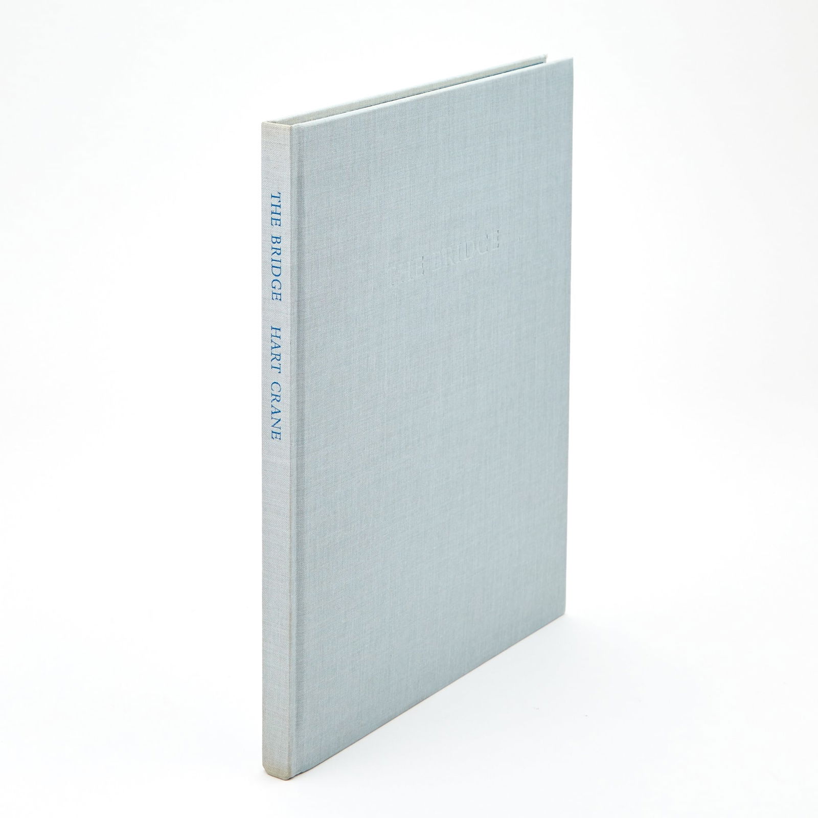 The Limited Editions Club Edition of Hart Crane's The Bridge: CRANE, HART The Bridge. The Limited Editions Club, 1985. Number 65 of 2000 copies signed by photographer Richard Benson. original pale blue cloth lettered in blind and in blue, paper-covered slipcase