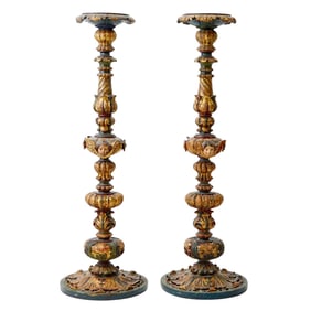 Pair of Italian Carved Polychrome and Parcel-Gilt Wood Candlesticks